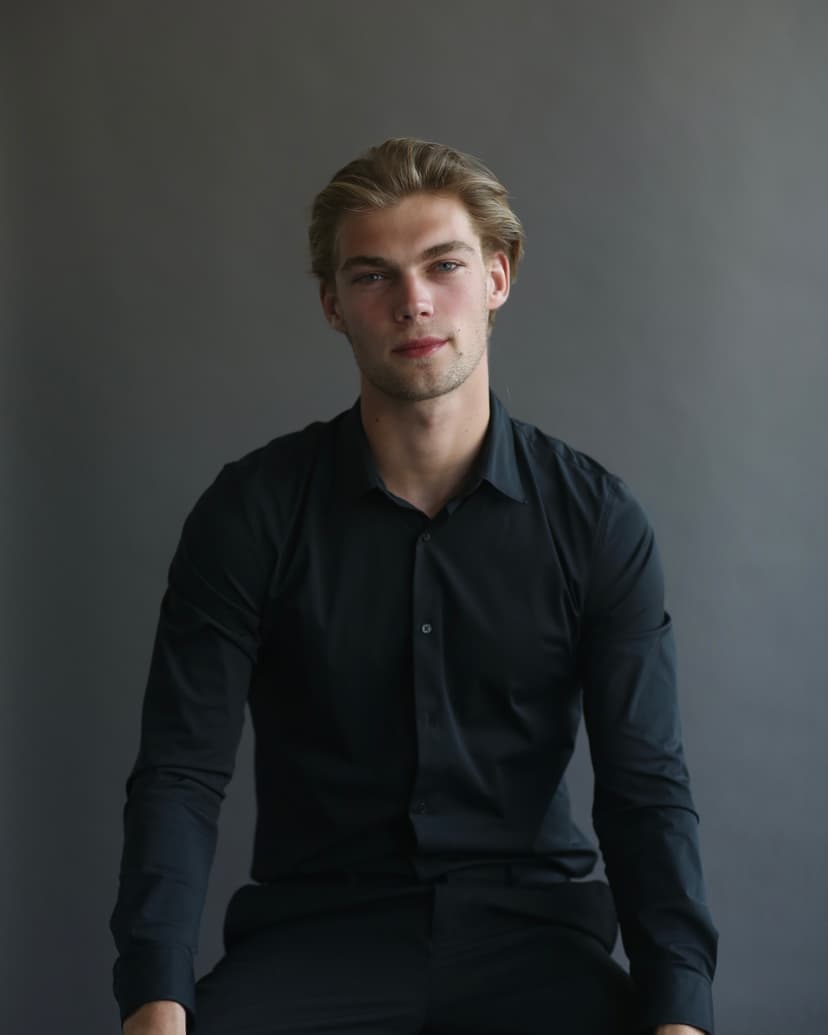 Model wearing women's black cotton crewneck tee.